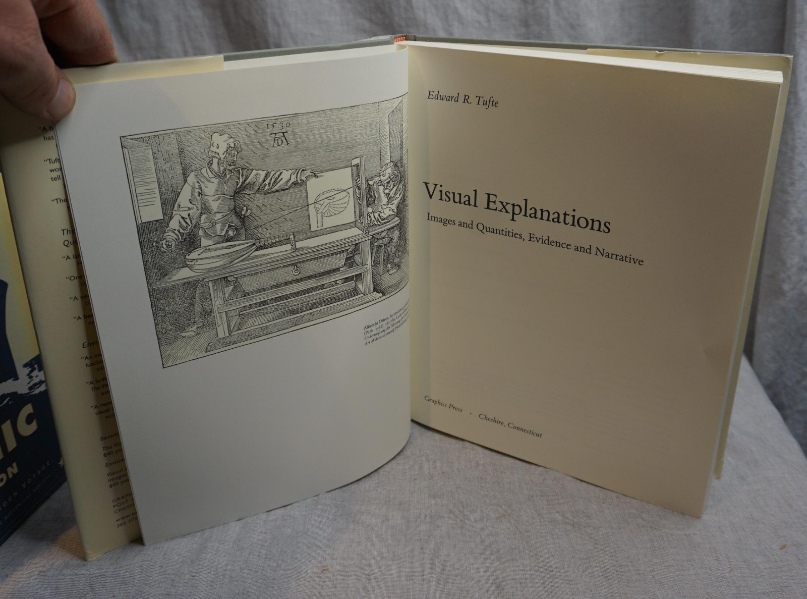 Visual Explanations by Tufte, Edward R. Dust Cover is Smudged, and Corner Dinged